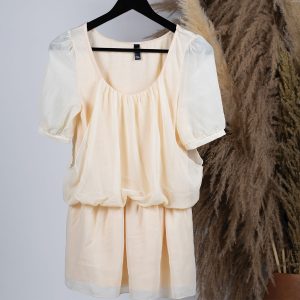 Blouse avec voile transparent